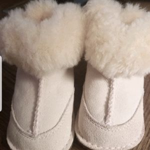 Uggs baby booties size small, pink.